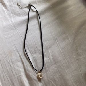 Necklace with gold shell